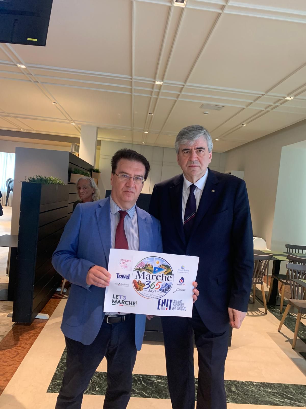 Marche Lorenzo Rossi with Tourism Minister Gianmarco Mazzi, who expressed satisfaction with the promotion of the region.