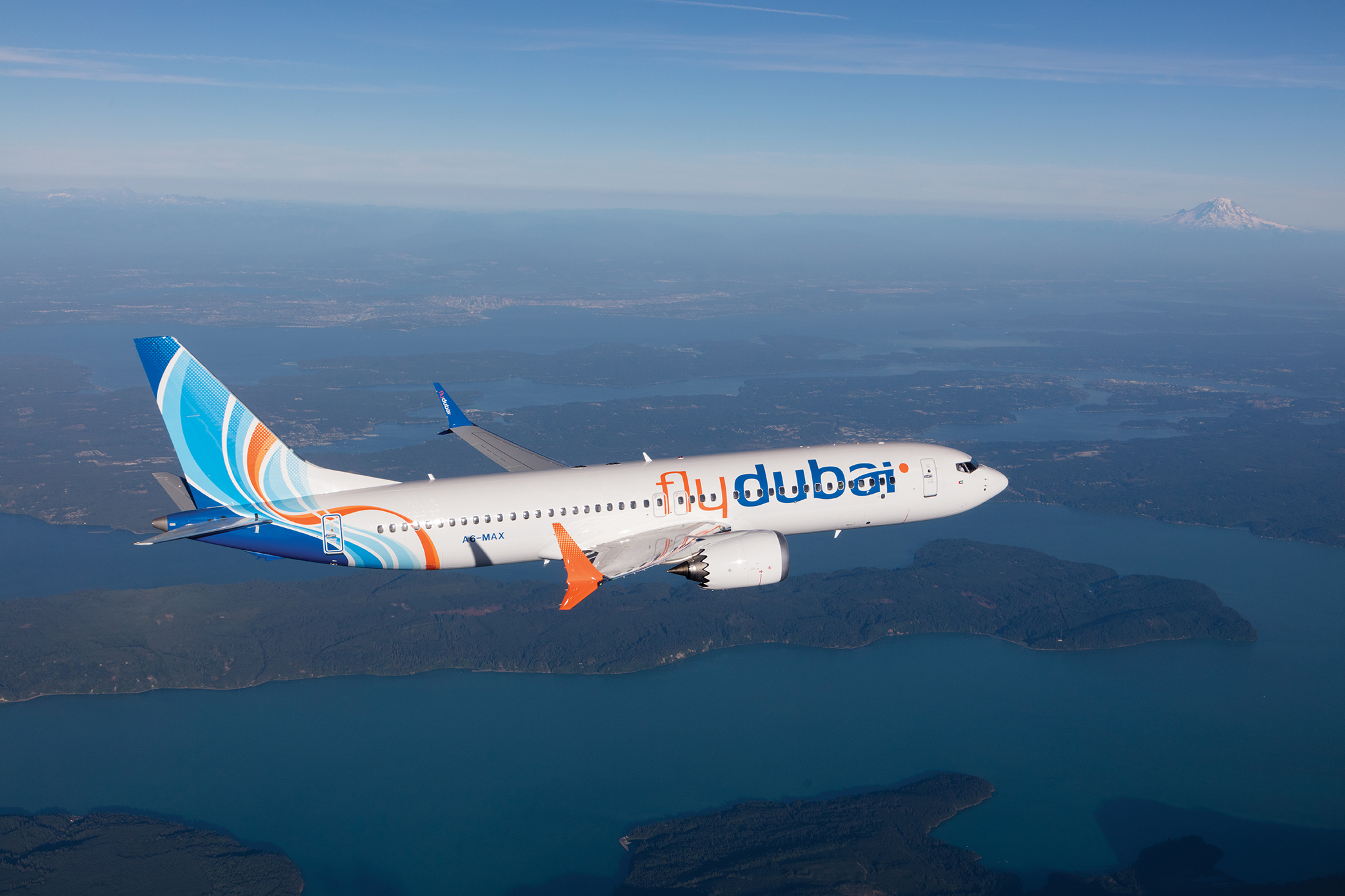 Flydubai Boeing 737 MAX 8 photographed on July 26, 2017 from Wolfe Air Aviation’s Learjet 25B.